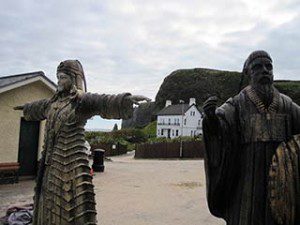 Game of Thrones film set at Downhill Beach: the second of the 'gods' is lifted onto the beach