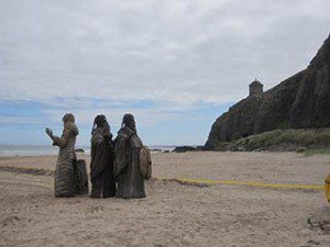 Game of Thrones film location Downhill Northern Ireland 'old gods' sculpture on the beach under Mussenden Temple